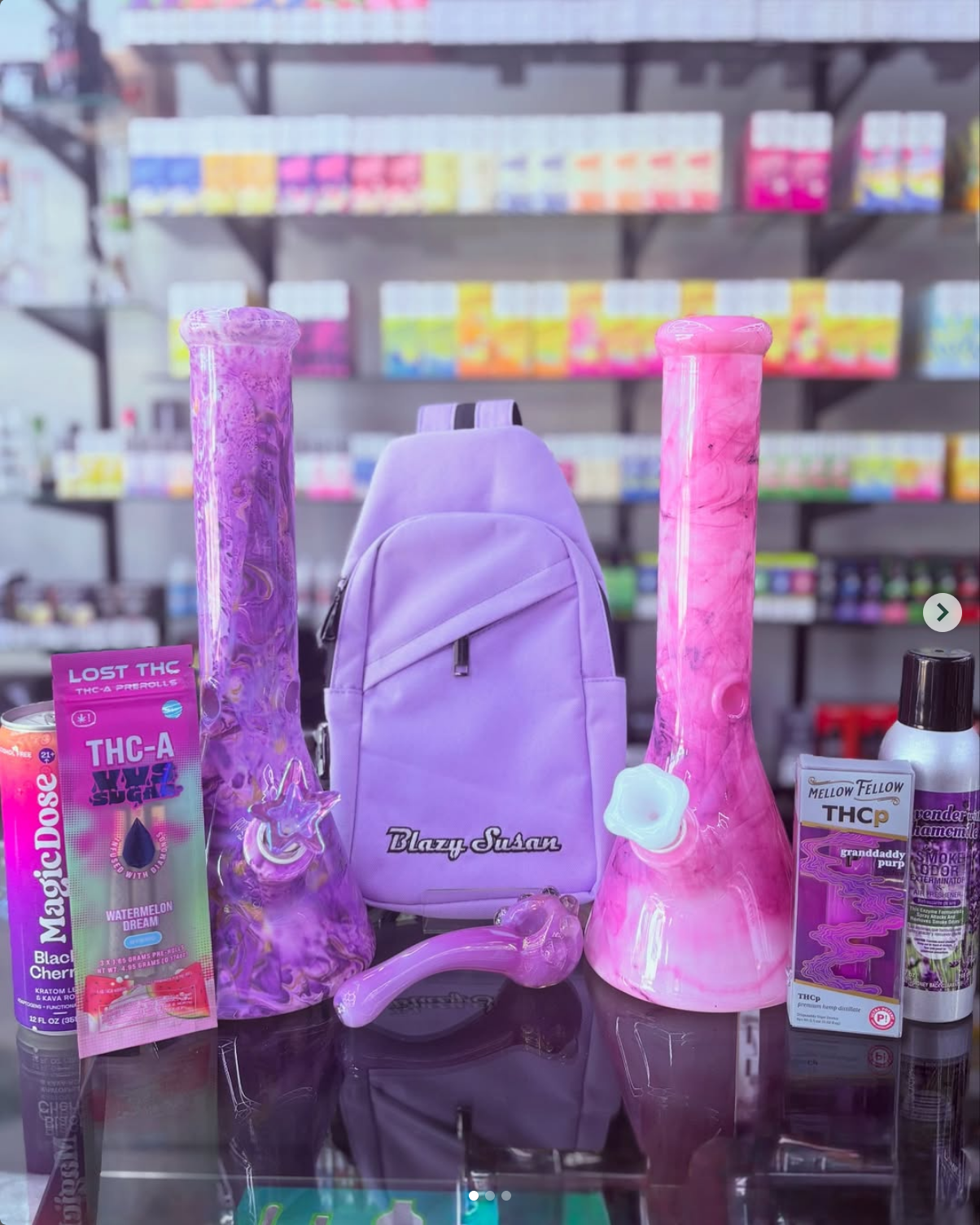 Purple Blazy Susan collection with glass bongs and accessories at Cloud Factory